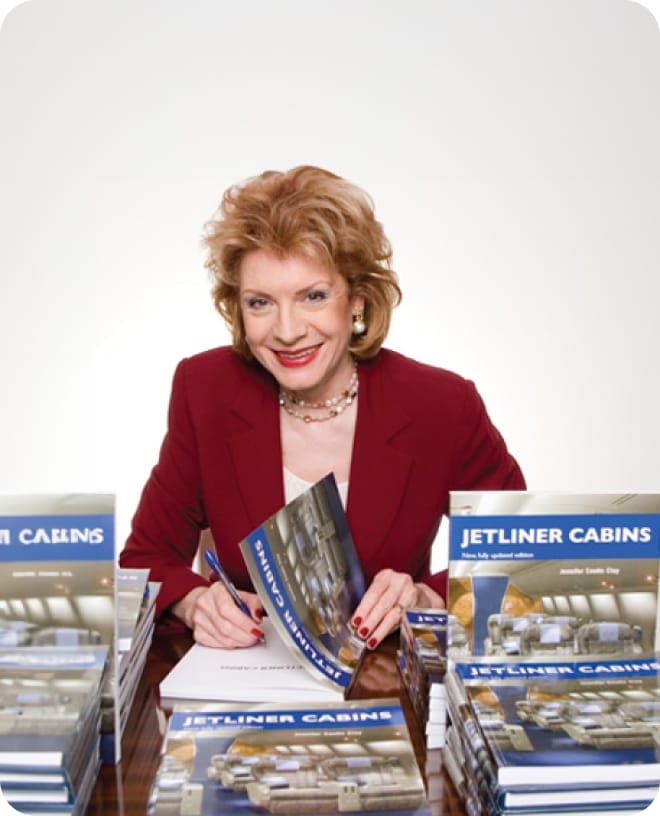 Jennifer signing paperbacks